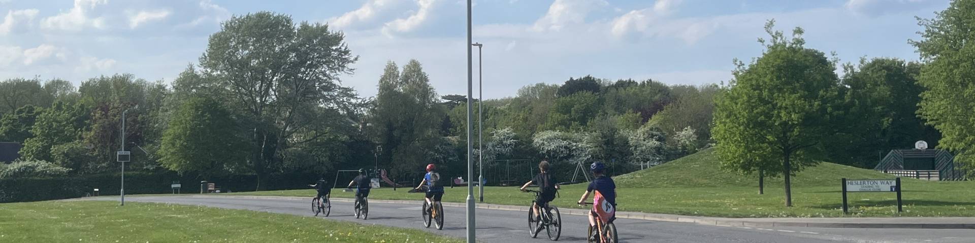 Five children cycling through Barrington