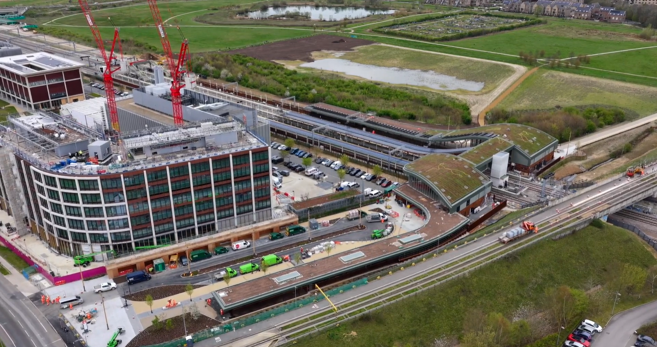 Aerial photograph of Cambridge South Station with Hobson's Park in the background