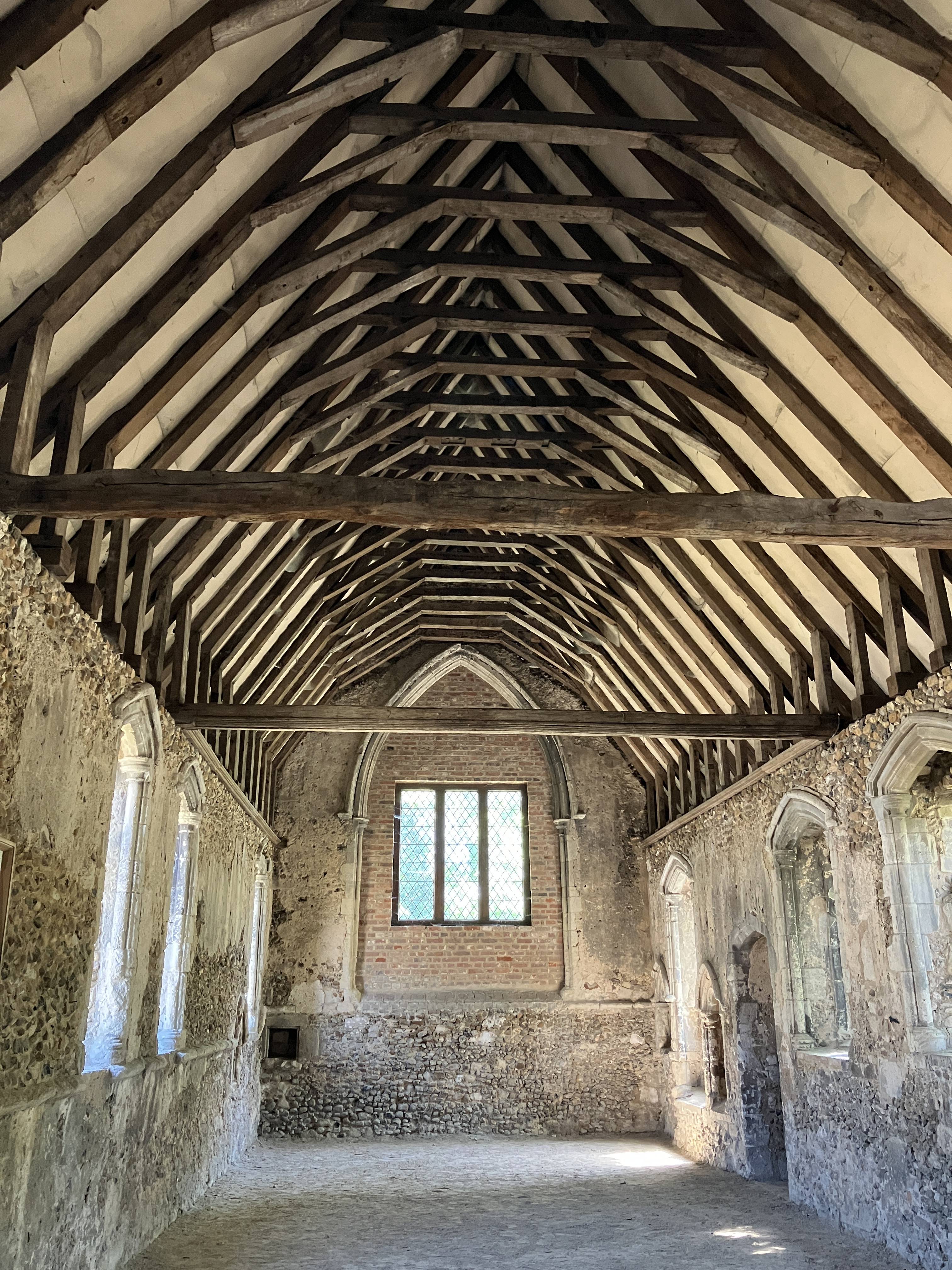 Photograph of the inside of Duxford Chapel showing the roof beams
