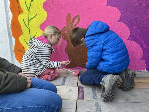 Children painting a rabbit at the Meldreth Wonderpass