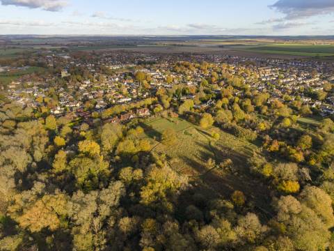 An aerial photograph of Melbourn Village showing the paths through the Stockbridge Meadows Nature Reserve